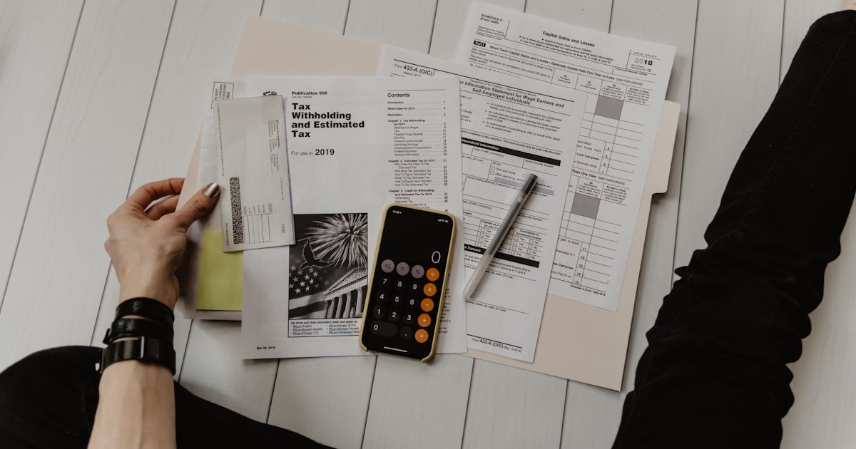 Calculator and paperwork - understanding bailiff fees